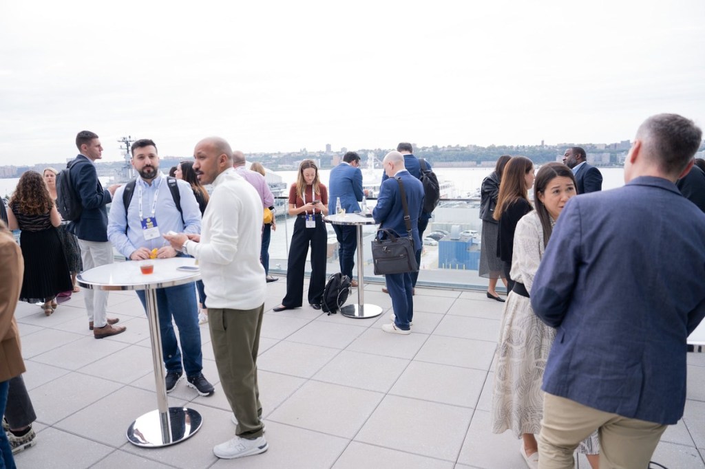 attendees networking outdoors at Skift Global Forum